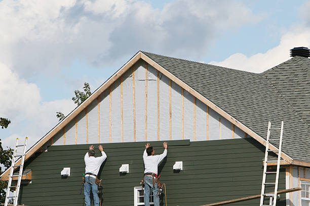 Professional Emergency Siding Repair technician working in Keene, VA
